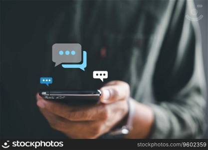 Man smartphone becomes portal for live chat engagement, representing social networking and chatting concepts. Chat box icons highlight interplay of communication and modern technology.