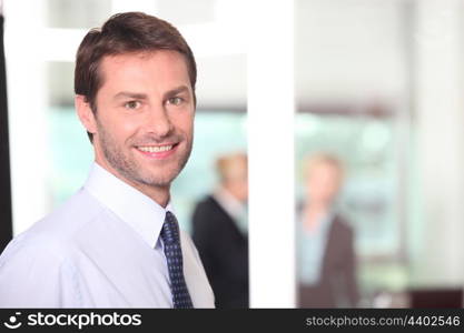 Man smiling in the office