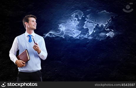 Man smoking pipe. Conceptual image of young handsome man smoking pipe