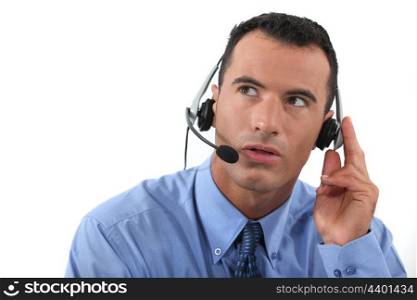 Man speaking into a hands-free headset