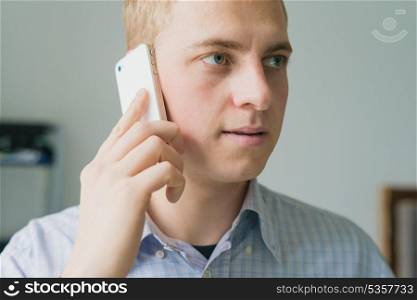 Man speaks on smartphone