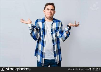 Man spreading palms, feeling clueless and uncertain. Person with puzzled gesture spreading hands, Concept of a puzzled man spreading hands isolated. Guy with puzzled gesture spreading palms