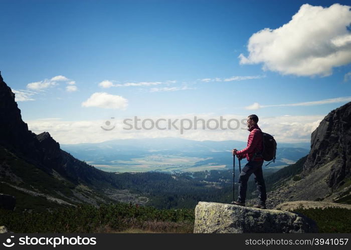 Man standing at the mountain top