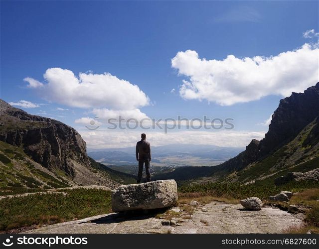 Man standing at the mountain top