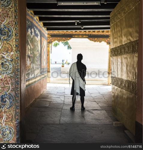 Man standing in corridor, Punakha Dzong, Punakha, Punakha Valley, Punakha District, Bhutan