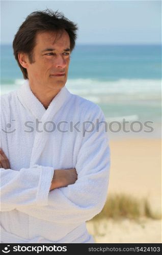 Man standing in sand dunes