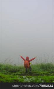 Man standing in the fog