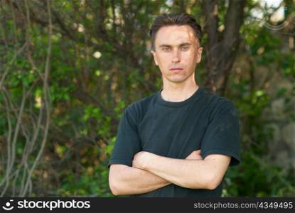 Man staying in the forest with soft background