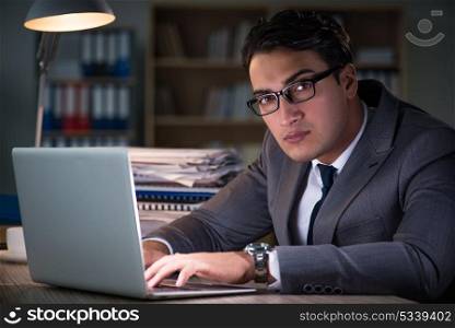 Man staying in the office for long hours