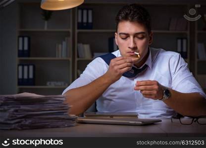 Man staying late at night and smoking marijuana
