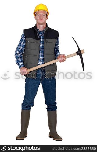 Man stood with pick ax