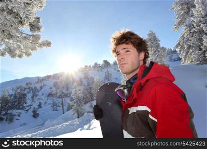 Man stood with snowboard