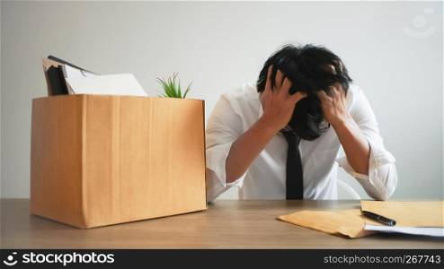 man stressing with resignation letter for quit a job.