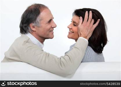 Man stroking his wife&rsquo;s head