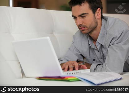 Man studying at home
