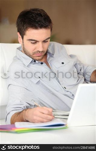 Man studying from home