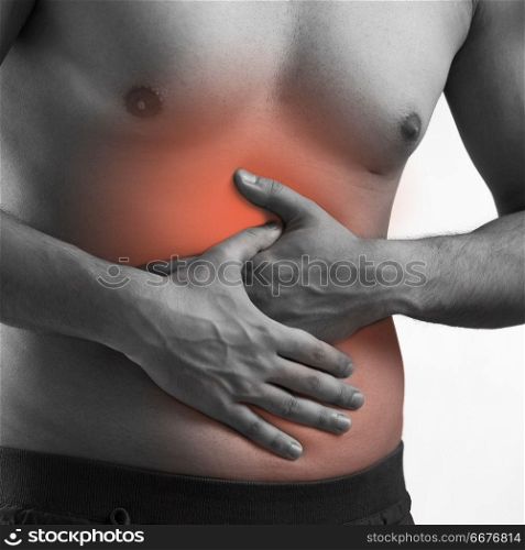 Man suffering from acute pain. Man suffering from acute pain on abdomen