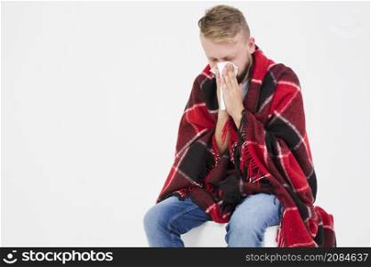 man suffering from cold