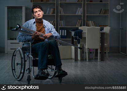 Man suffering from depression at wheelchair