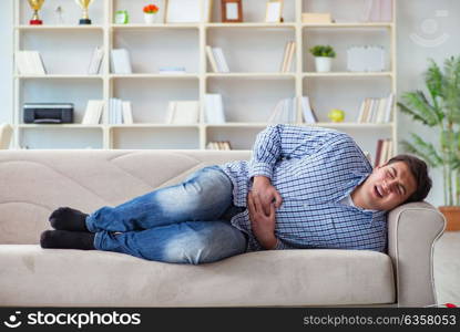 Man suffering from pain at home