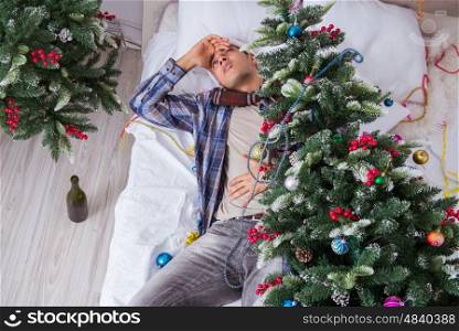 Man suffering hangover after christmas party