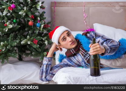 Man suffering hangover after christmas party