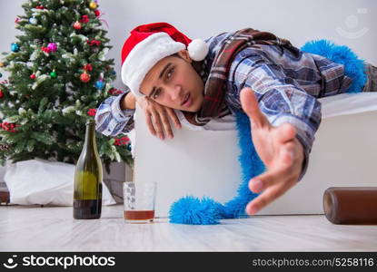 Man suffering hangover after christmas party