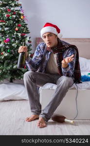 Man suffering hangover after christmas party