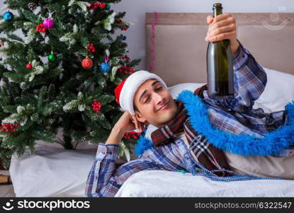 Man suffering hangover after christmas party