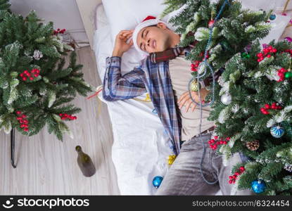 Man suffering hangover after christmas party