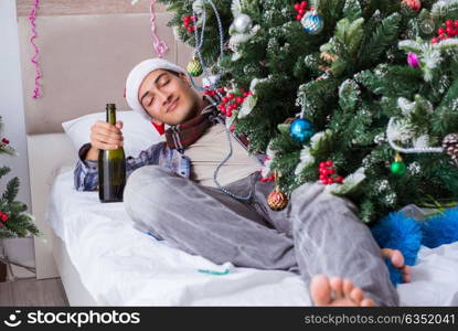 Man suffering hangover after christmas party