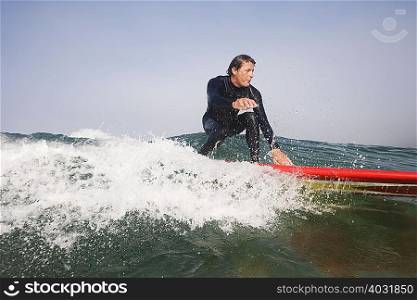 Man surfing a wave