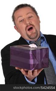 Man surprised at having received a gift