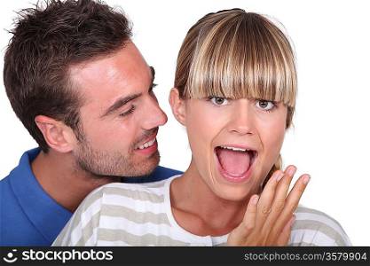man surprising his girlfriend