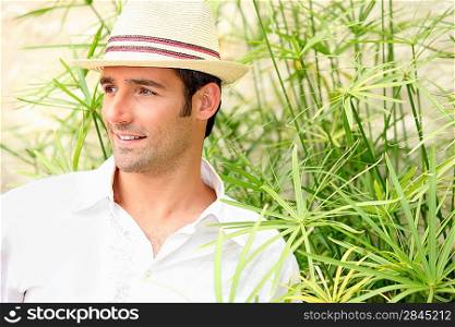 Man surrounded by tall grass