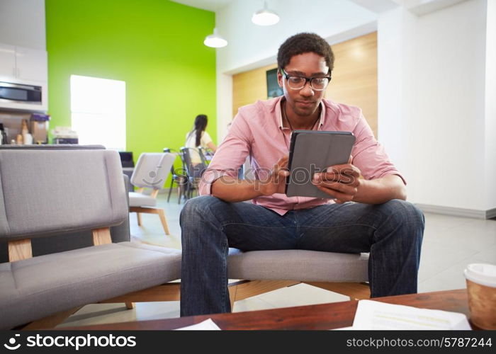 Man Taking A Break Working In Design Studio