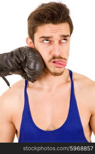 Man taking a punch with black boxing glove, isolated on white background.