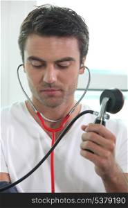 Man taking blood pressure