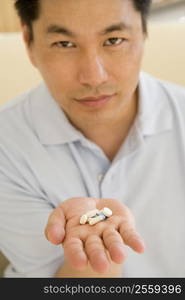 Man Taking Pills