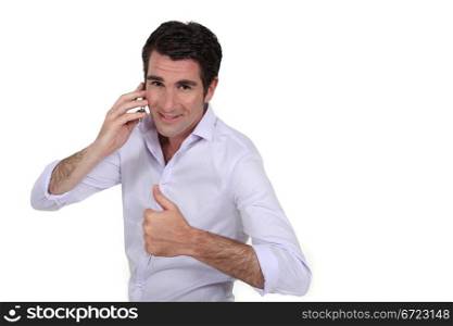 Man talking on the phone and giving the thumb&rsquo;s up
