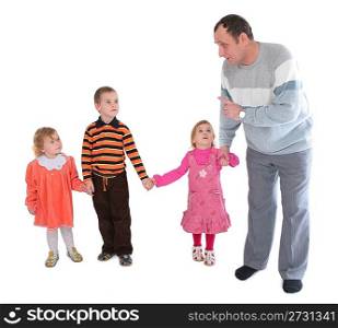 Man talking to three kids