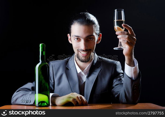 Man tasting wine in glass