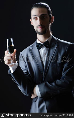 Man tasting wine in glass