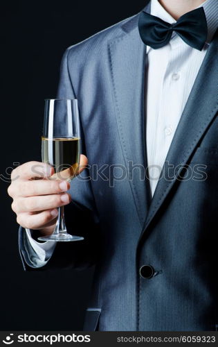 Man tasting wine in glass