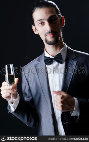 Man tasting wine in glass