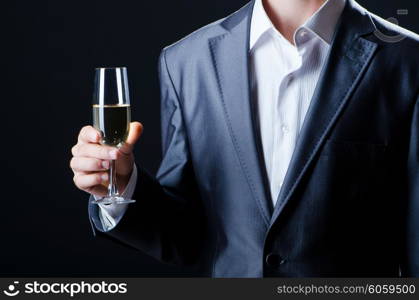 Man tasting wine in glass