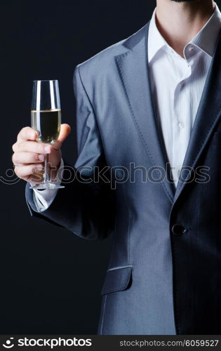 Man tasting wine in glass