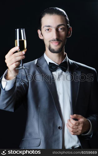 Man tasting wine in glass