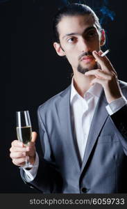 Man tasting wine in glass