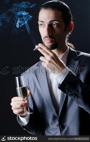 Man tasting wine in glass